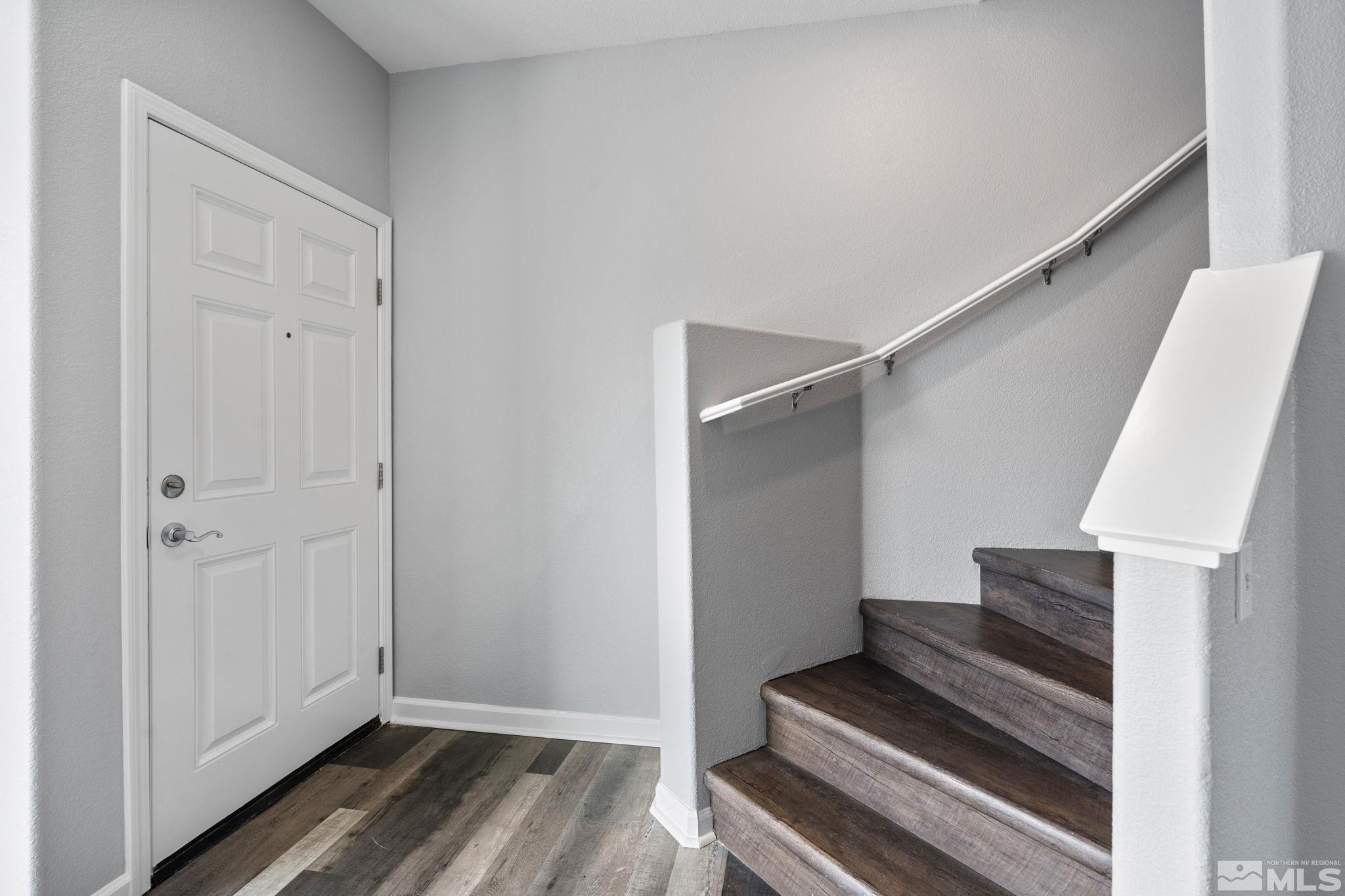 345 Madison Marie Lane Reno, NV 89503 - Photo 4 of 34 a view of entryway with wooden floor