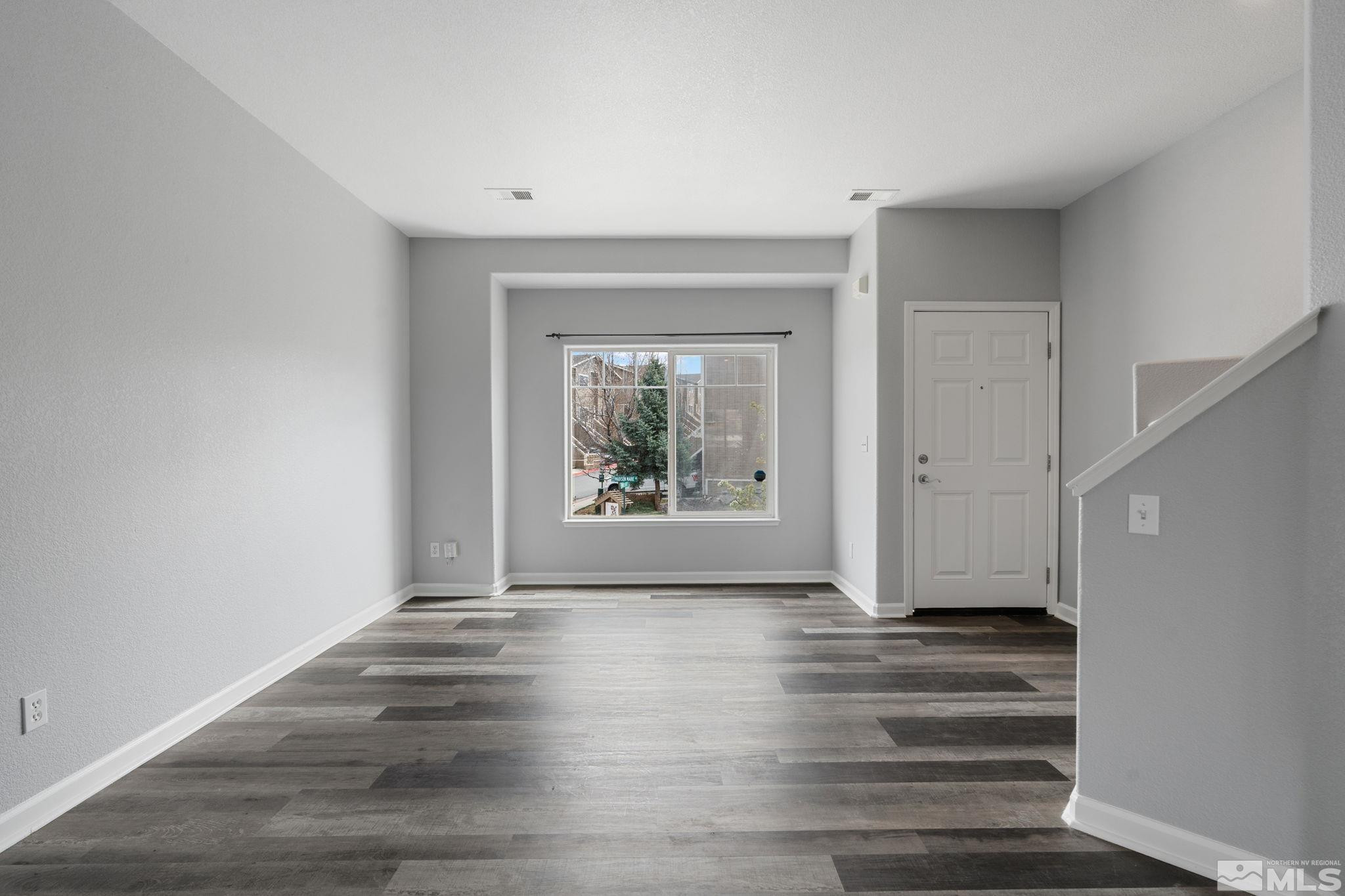 345 Madison Marie Lane Reno, NV 89503 - Photo 8 of 34 a view of an empty room with a window