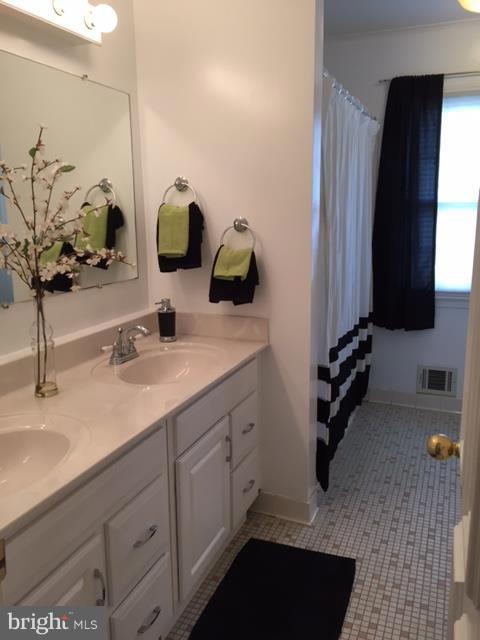 4711 Pickett Road Fairfax, VA 22032 - Photo 21 of 30 Second Full Bath with Double Vanity