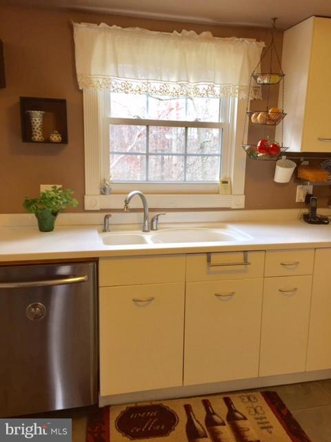 4711 Pickett Road Fairfax, VA 22032 - Photo 8 of 30 Corian Double Sink with Window Above
