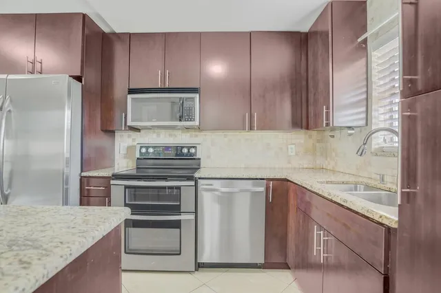 $2,100 | 9851 Sandalfoot Boulevard, Unit 207, Boca Raton, FL 33428