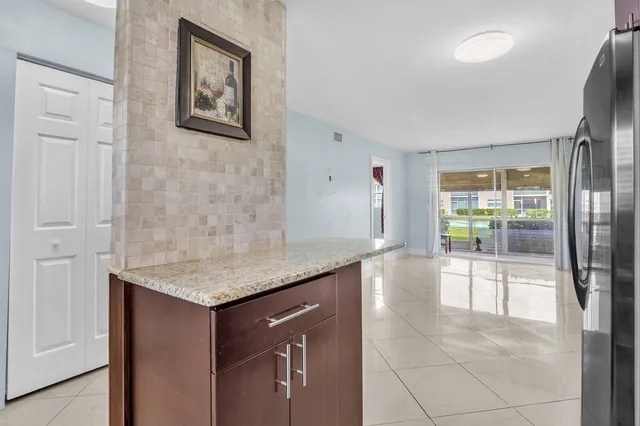 $2,100 | 9851 Sandalfoot Boulevard, Unit 207, Boca Raton, FL 33428