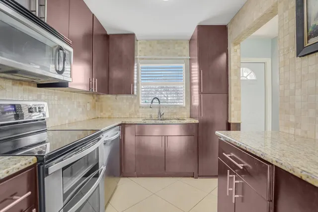 $2,100 | 9851 Sandalfoot Boulevard, Unit 207, Boca Raton, FL 33428