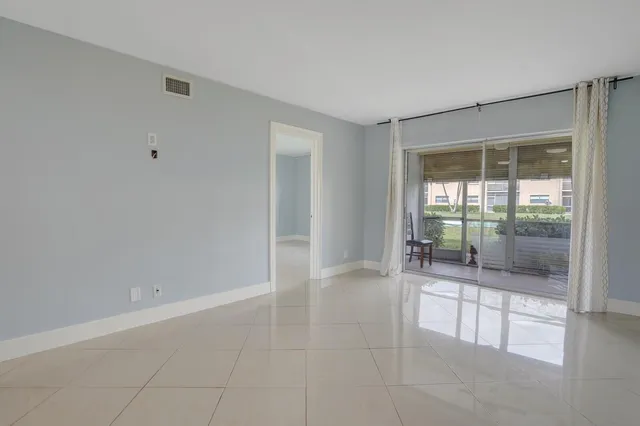 $2,100 | 9851 Sandalfoot Boulevard, Unit 207, Boca Raton, FL 33428