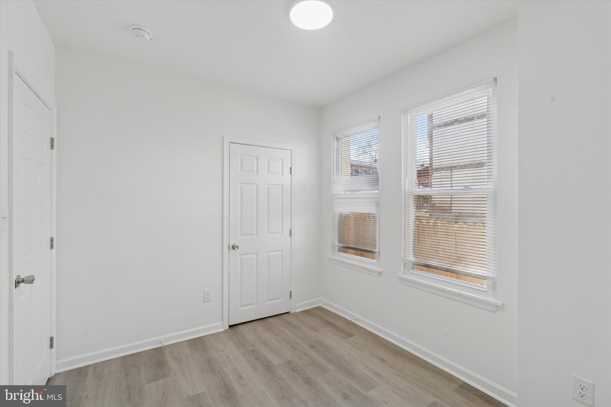 3827 Cambridge Street, Unit 1 Philadelphia, PA 19104 - Photo 4 of 7 a view of an empty room with window and closet area