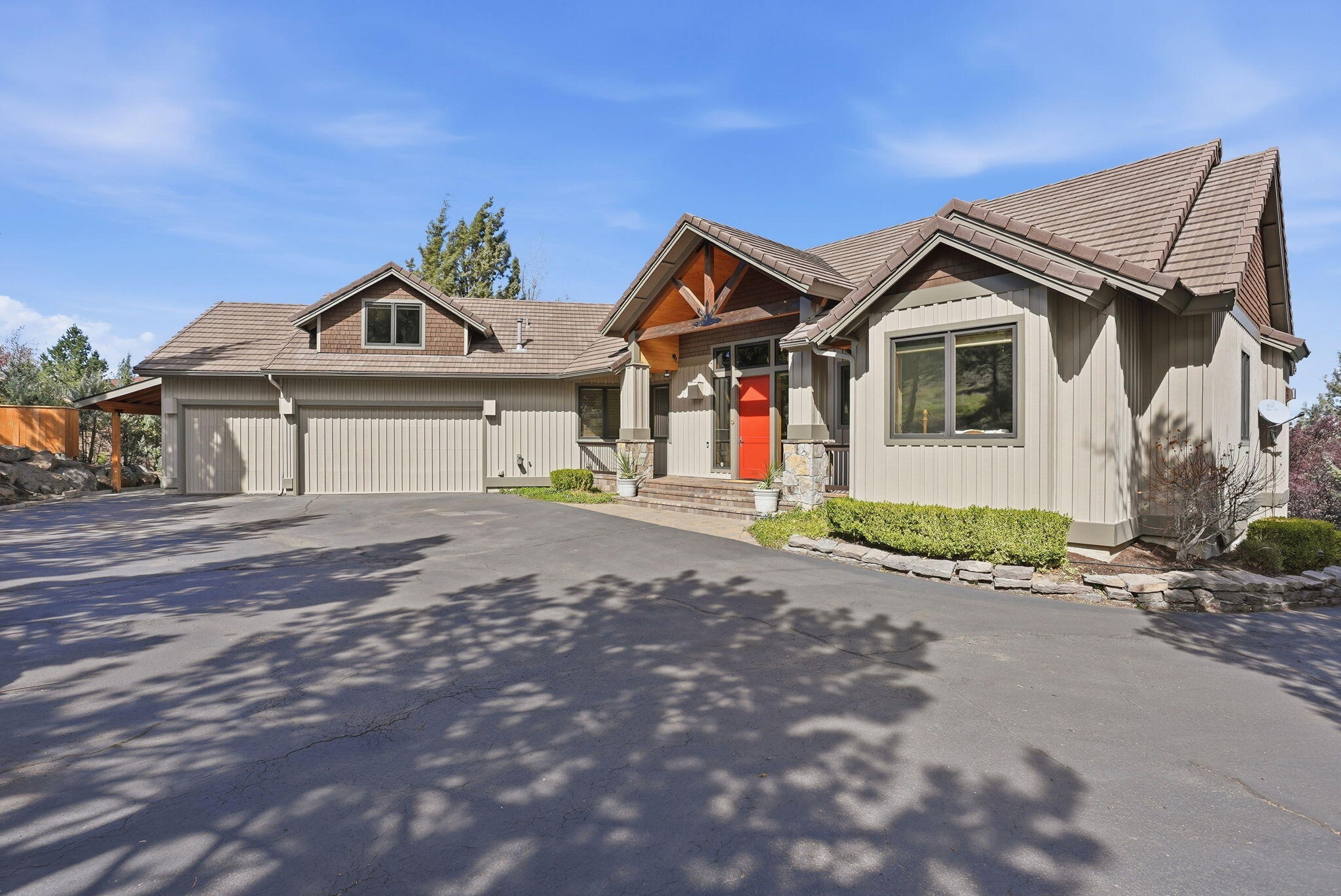 631 Sundance Ridge Court Redmond, OR 97756 - Photo 3 of 61 a front view of a house with a yard