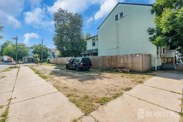 a car parked in front of a house