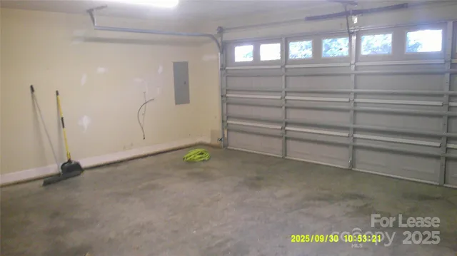 a view of a room with stairs and a window