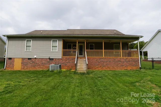 a house view with a garden space
