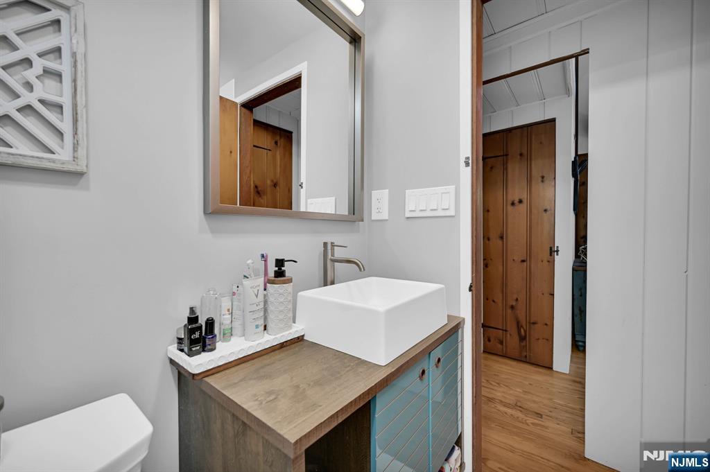 85 Breakneck Road Vernon, NJ 07422 - Photo 12 of 32 a bathroom with a sink and a toilet