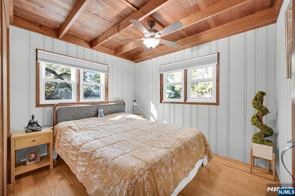 85 Breakneck Road Vernon, NJ 07422 - Photo 13 of 32 a bedroom with a bed and a window