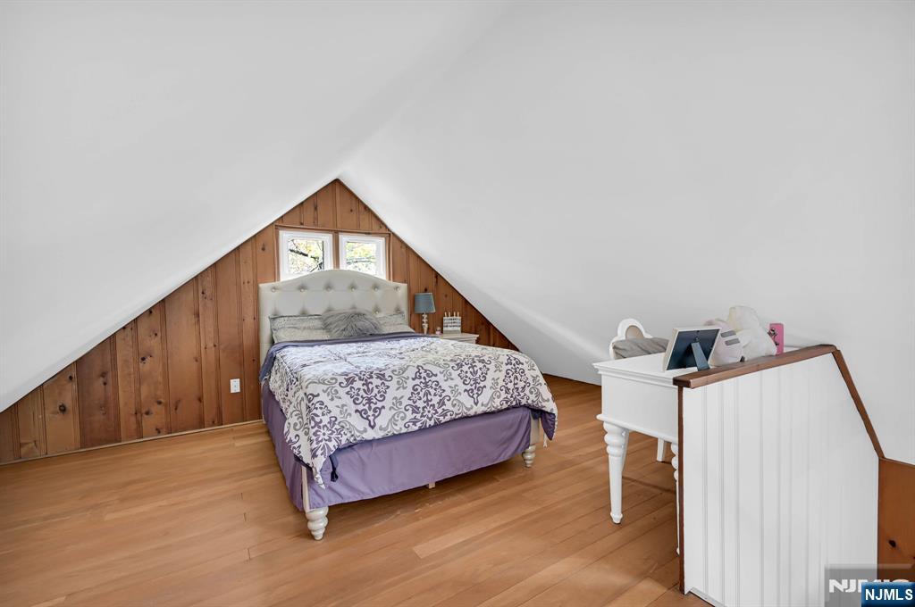 85 Breakneck Road Vernon, NJ 07422 - Photo 16 of 32 a living room with furniture and a wooden floor