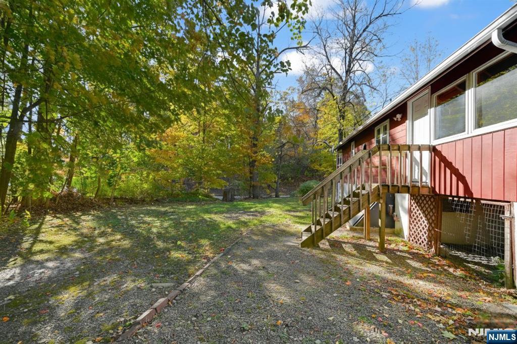 85 Breakneck Road Vernon, NJ 07422 - Photo 17 of 32 a view of an house with a yard