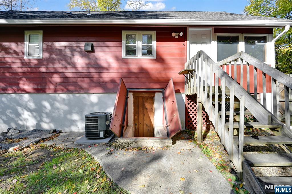 85 Breakneck Road Vernon, NJ 07422 - Photo 18 of 32 a front view of a house with a yard