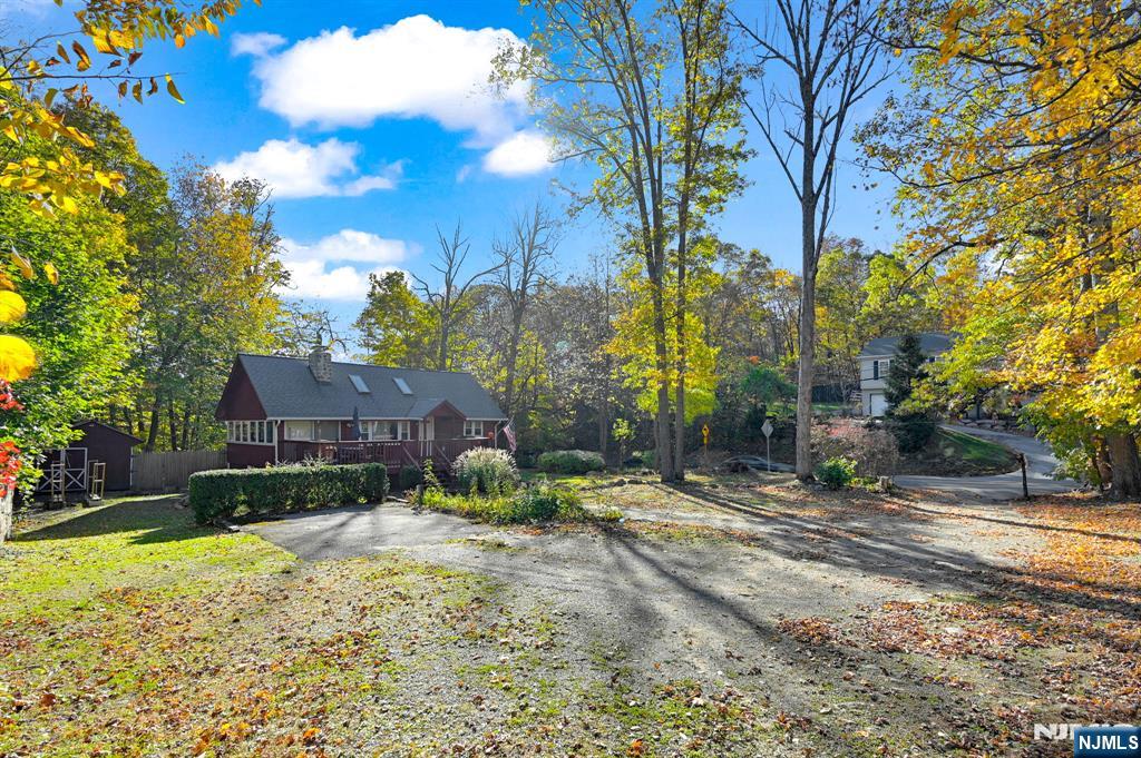85 Breakneck Road Vernon, NJ 07422 - Photo 22 of 32 a view of backyard with a garden and trees