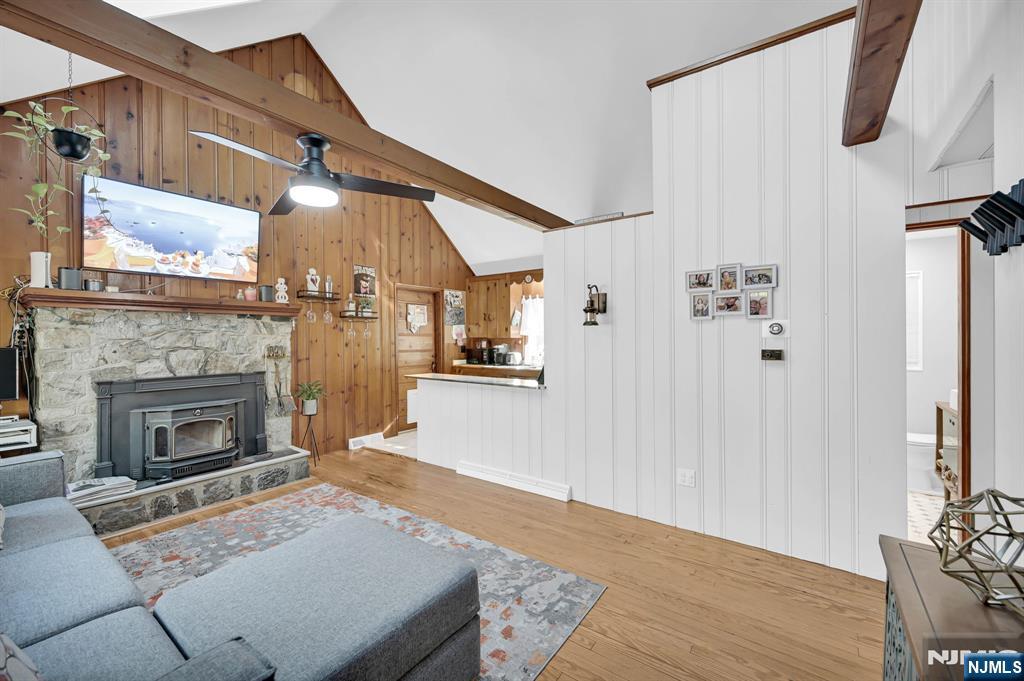 85 Breakneck Road Vernon, NJ 07422 - Photo 6 of 32 a living room with furniture and a fireplace