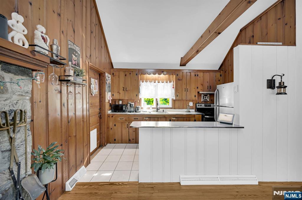 85 Breakneck Road Vernon, NJ 07422 - Photo 8 of 32 a kitchen with stainless steel appliances granite countertop a refrigerator and a stove top oven