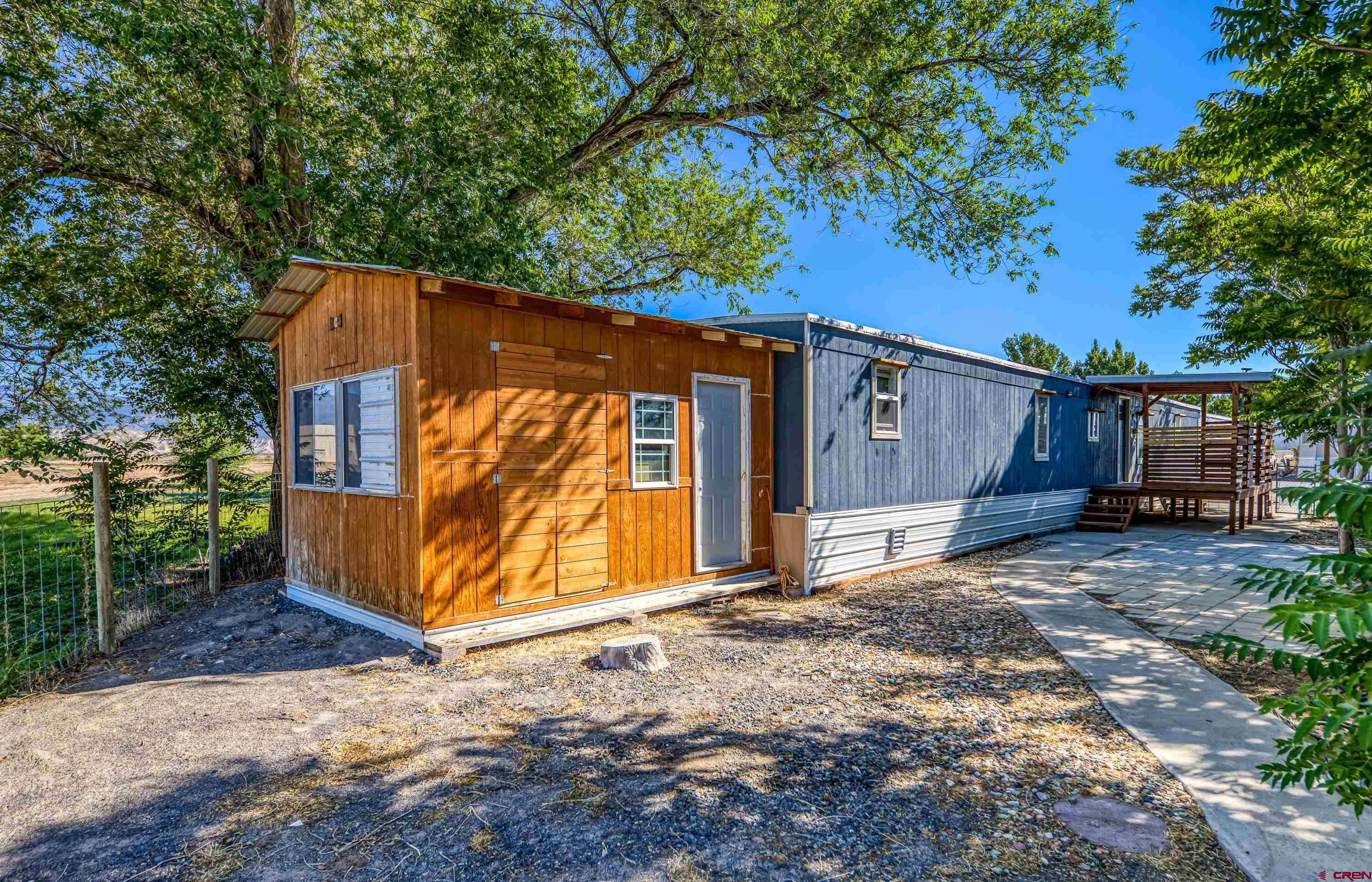 9925 Kremmling Road, Unit 22 Austin, CO 81410 - Photo 1 of 18 Yard with attached shed