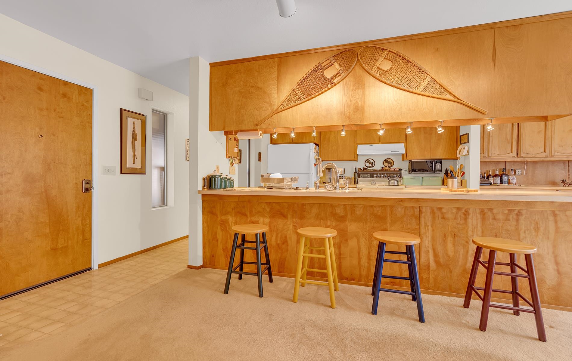 608 East Burnt Cedar Road Lake Almanor, CA 96137 - Photo 11 of 36 a dining room with a sink and a view of living room