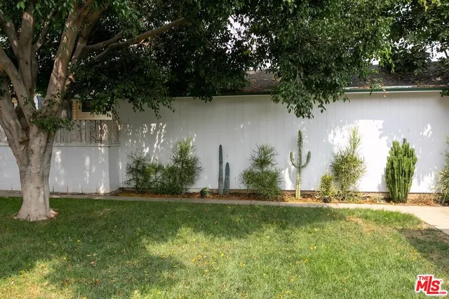 a view of a house with wooden stairs