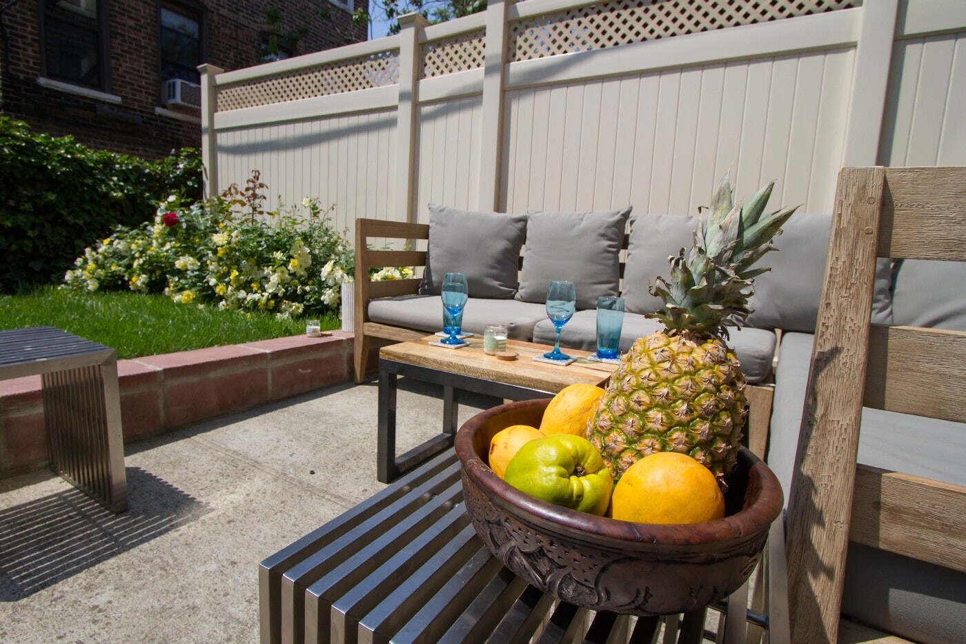 47-14 48th Street, Unit 1R Queens, NY 11377 - Photo 8 of 18 a view of a porch with furniture and garden