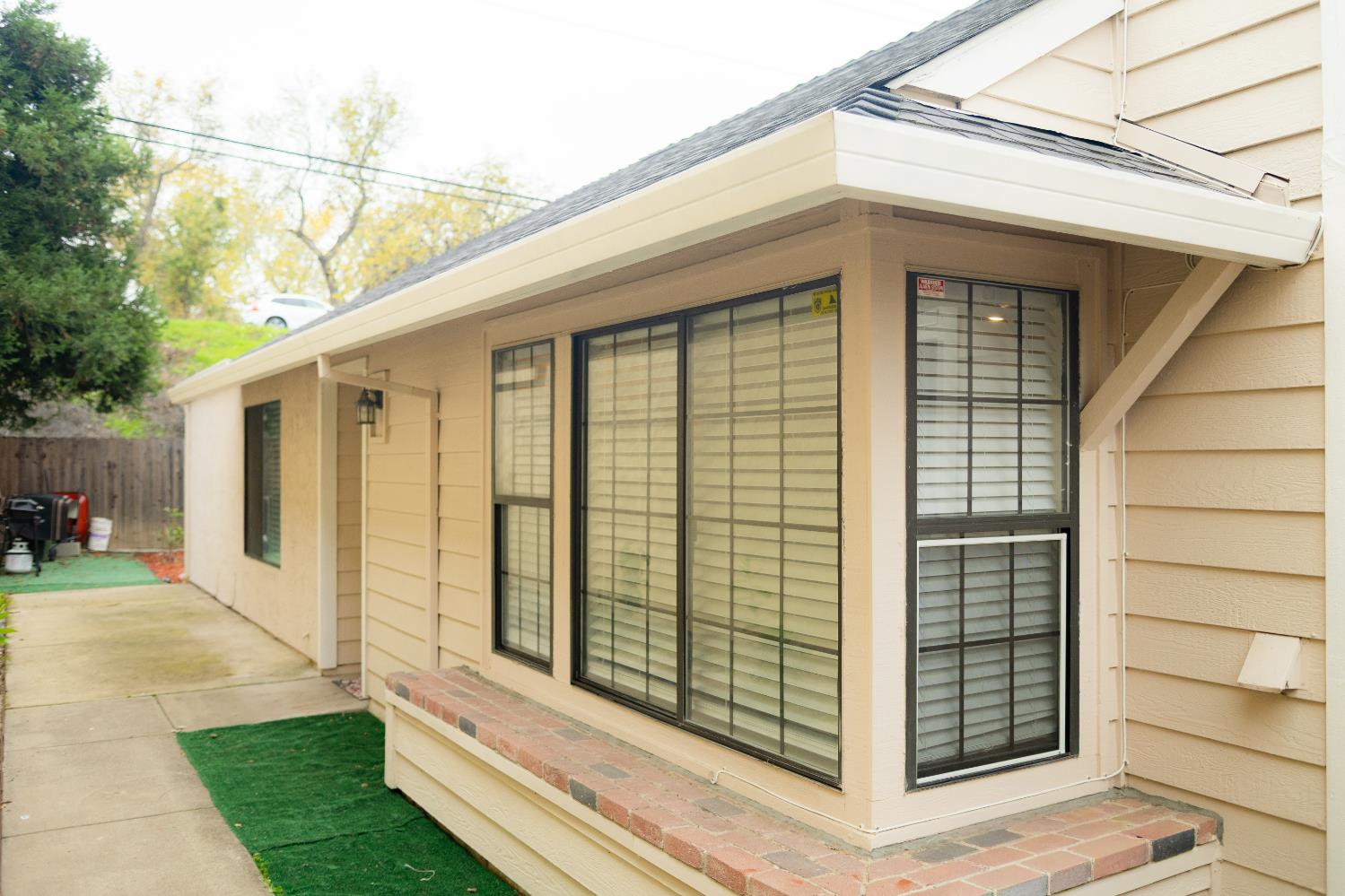 2263 Sandcastle Way Sacramento, CA 95833 - Photo 1 of 23 a front view of a house with a porch