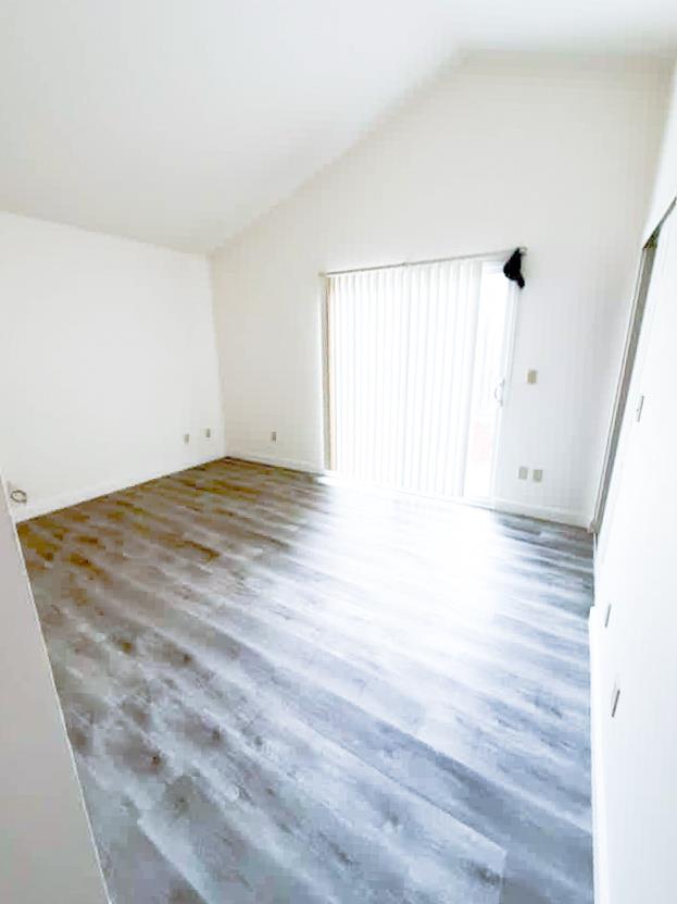 2263 Sandcastle Way Sacramento, CA 95833 - Photo 17 of 23 a view of a room with wooden floor and white walls