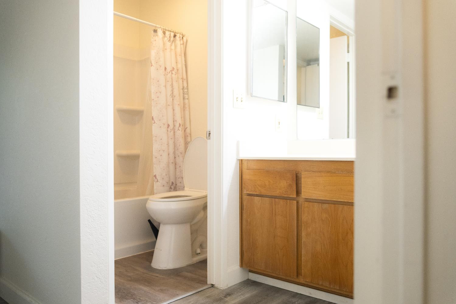 2263 Sandcastle Way Sacramento, CA 95833 - Photo 19 of 23 a bathroom with a toilet and a sink