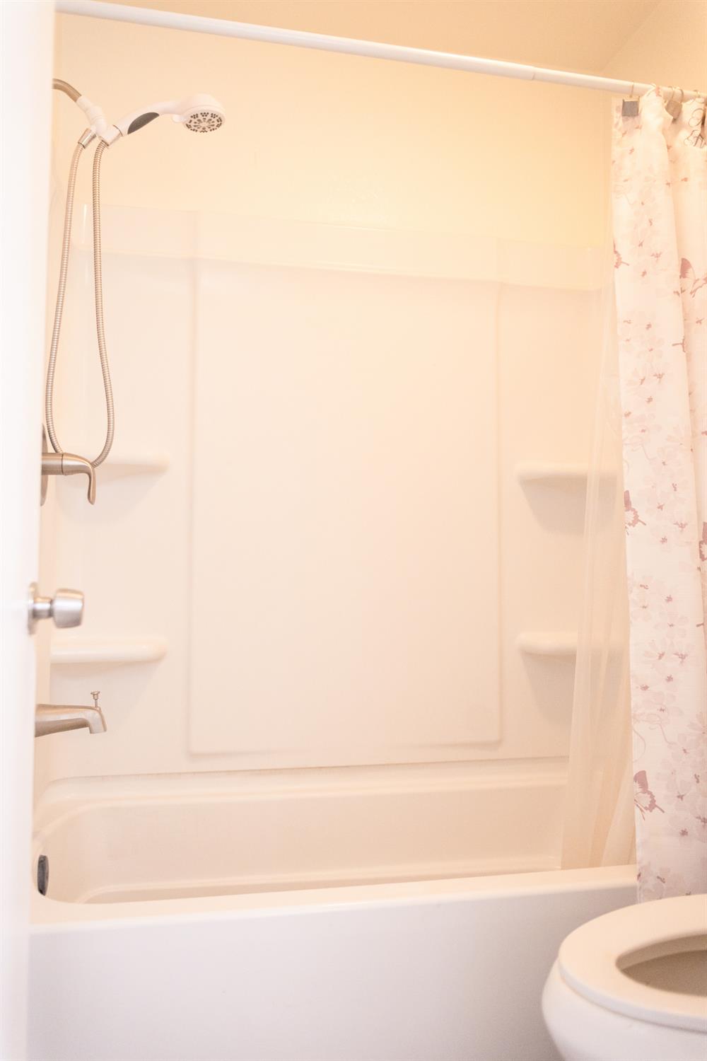 2263 Sandcastle Way Sacramento, CA 95833 - Photo 20 of 23 a bathroom with a shower