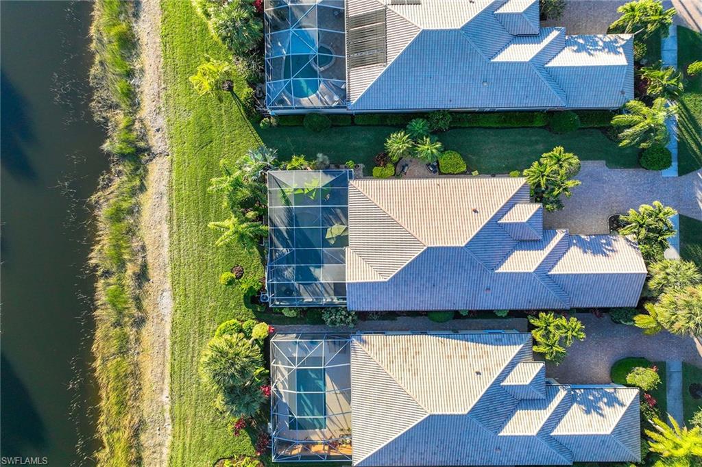 7534 Garibaldi Court Naples, FL 34114 - Photo 35 of 50 an aerial view of a house with a yard