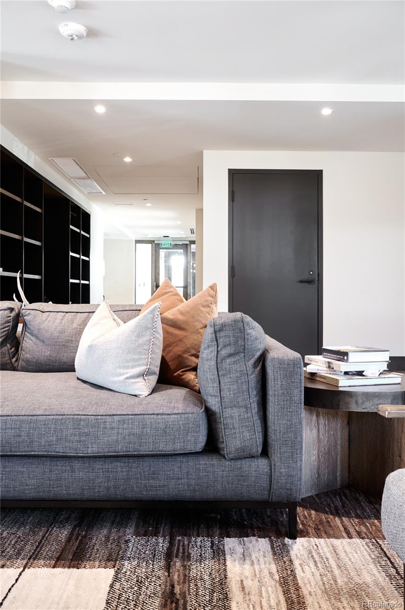 430 South Frontage Road East, Unit RUF Vail, CO 81657 - Photo 11 of 19 a living room with furniture and a fireplace