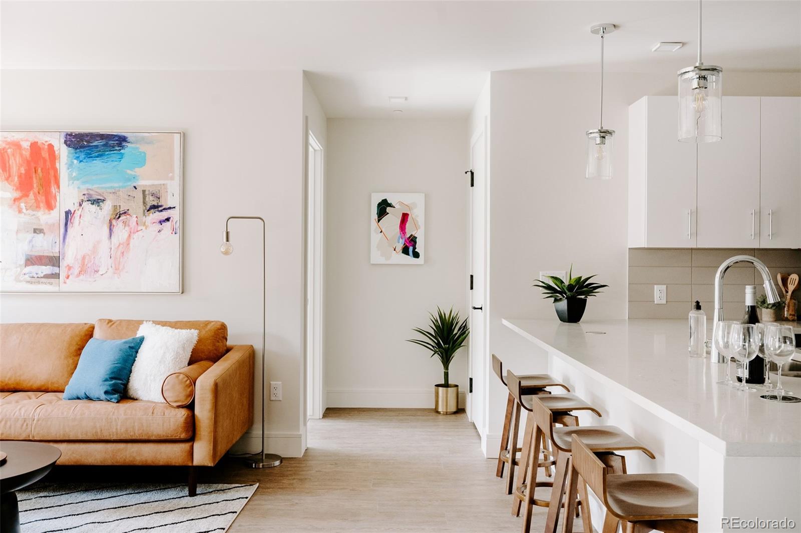 430 South Frontage Road East, Unit RUF Vail, CO 81657 - Photo 3 of 19 a living room with furniture and flowers