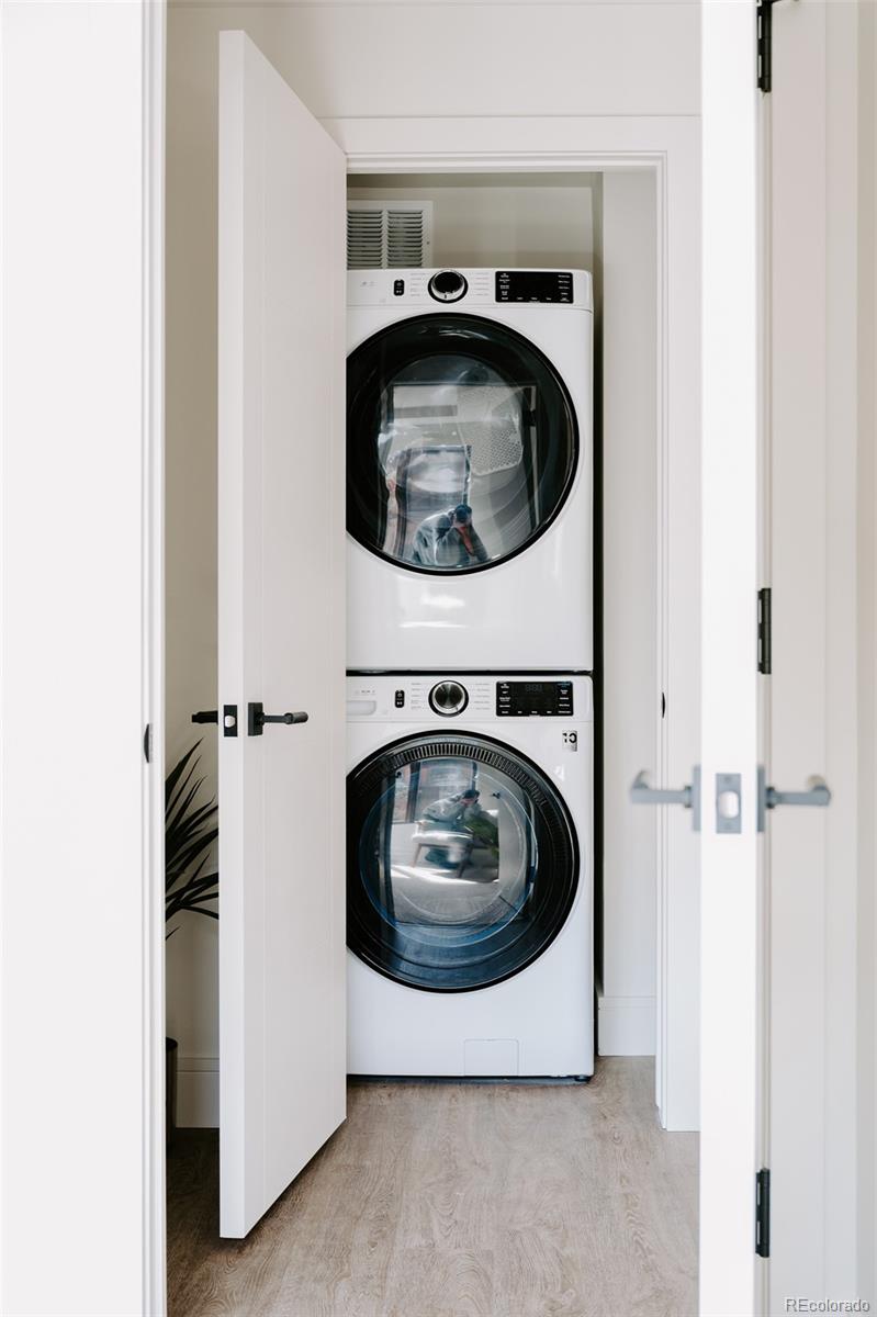 430 South Frontage Road East, Unit RUF Vail, CO 81657 - Photo 8 of 19 a utility room with washing machine