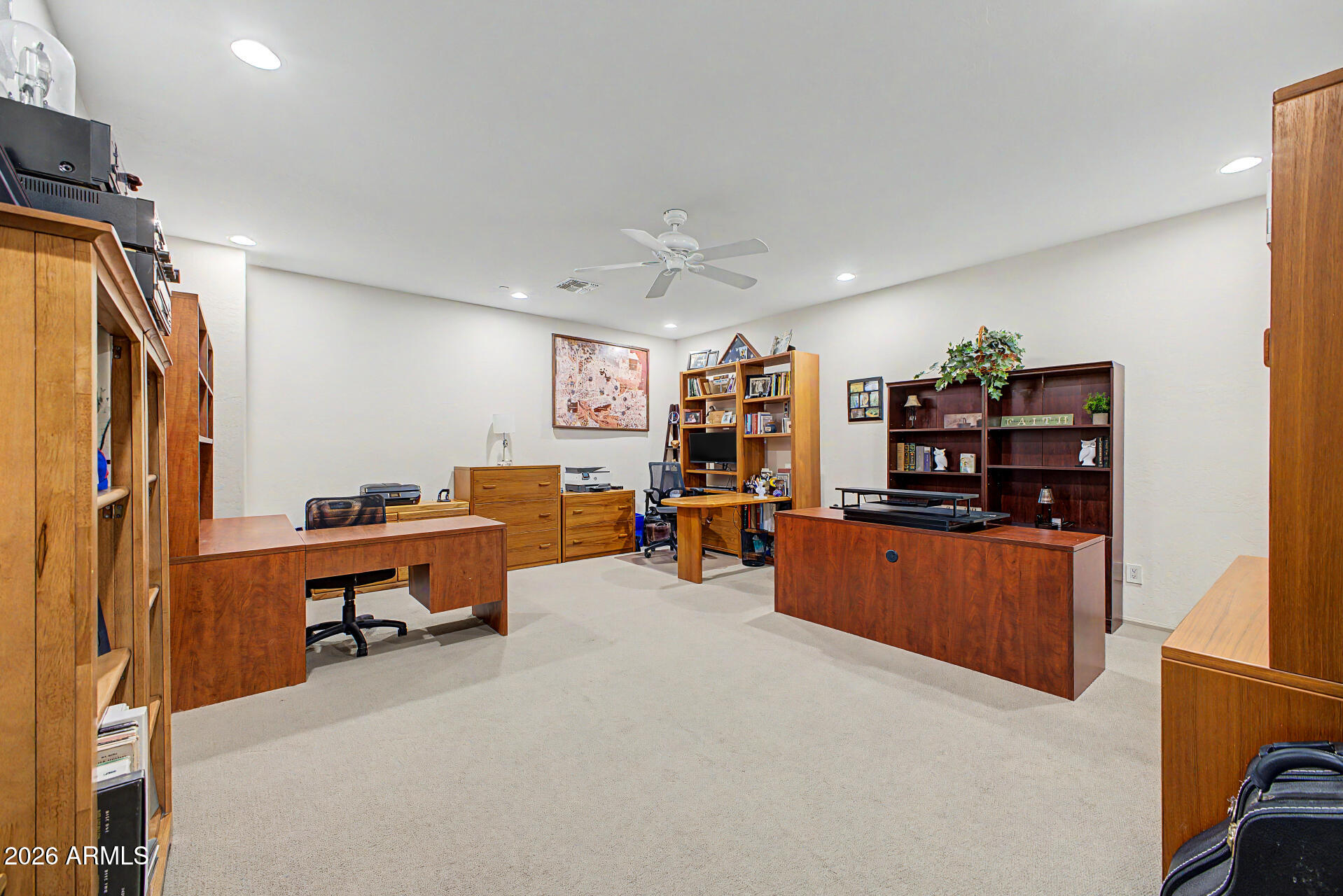 2996 East Agritopia Loop North Gilbert, AZ 85296 - Photo 33 of 73 a living room with furniture and a flat screen tv