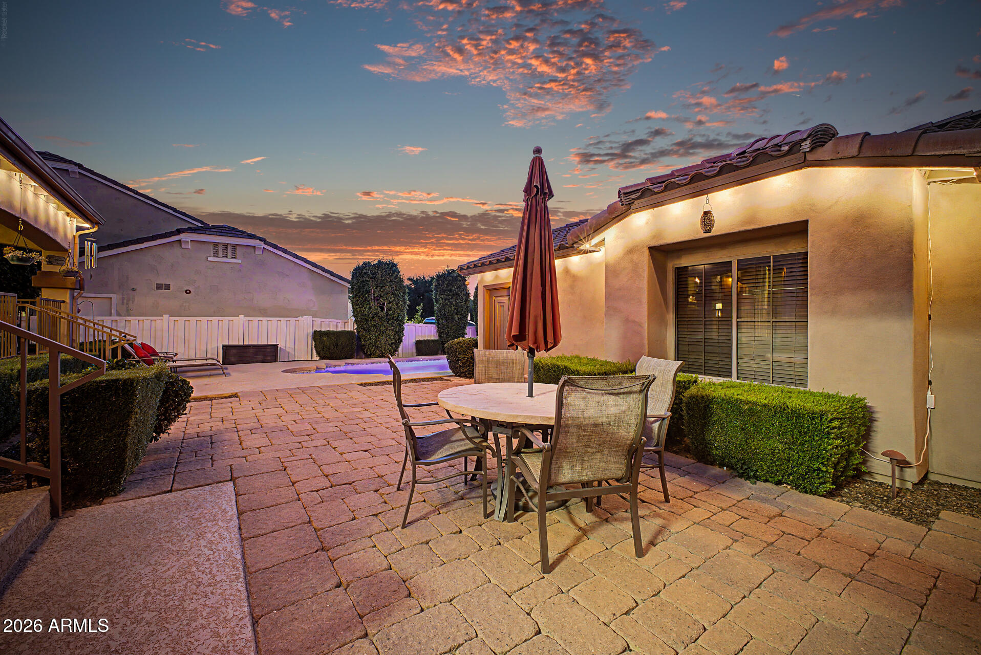2996 East Agritopia Loop North Gilbert, AZ 85296 - Photo 39 of 73 a view of a patio with a table and chairs and potted plants