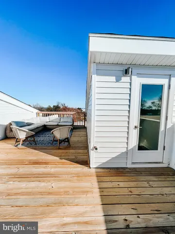a view of a balcony with two chairs