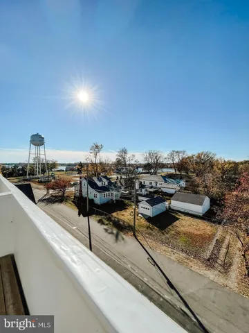 a view of a terrace with chairs