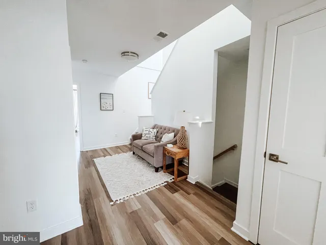 a workspace with furniture and a window