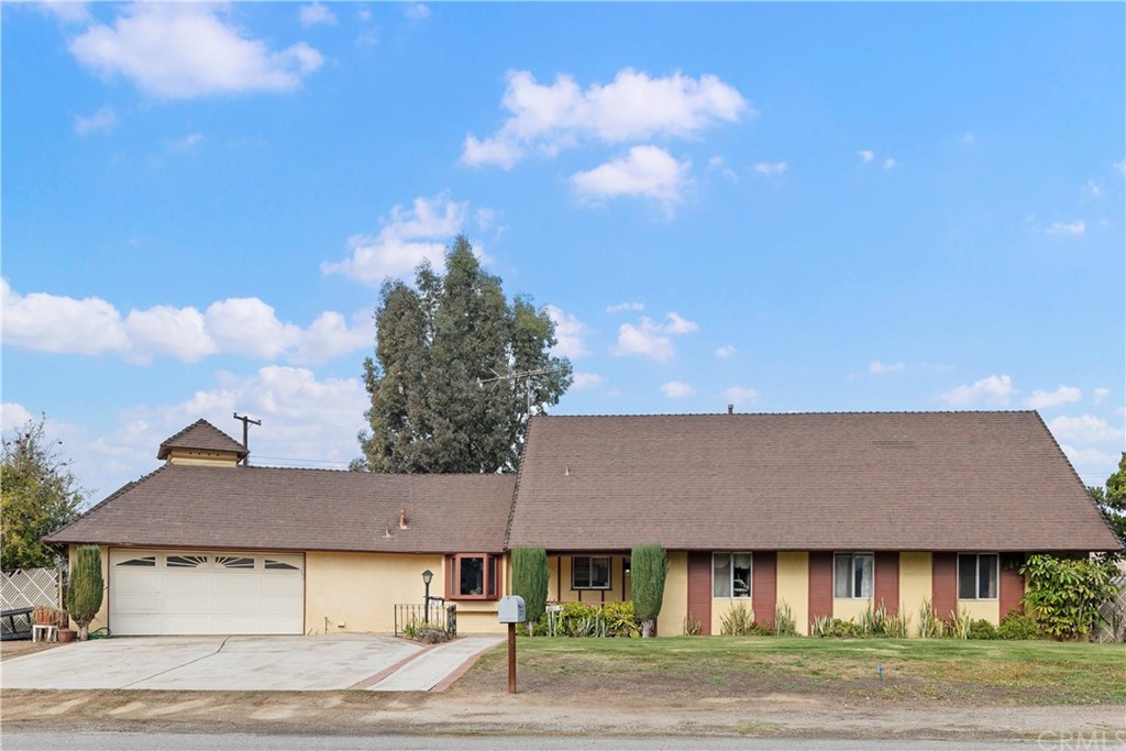 3271 Kips Korner Road Norco, CA 92860 - Photo 1 of 1 a front view of a house with garden