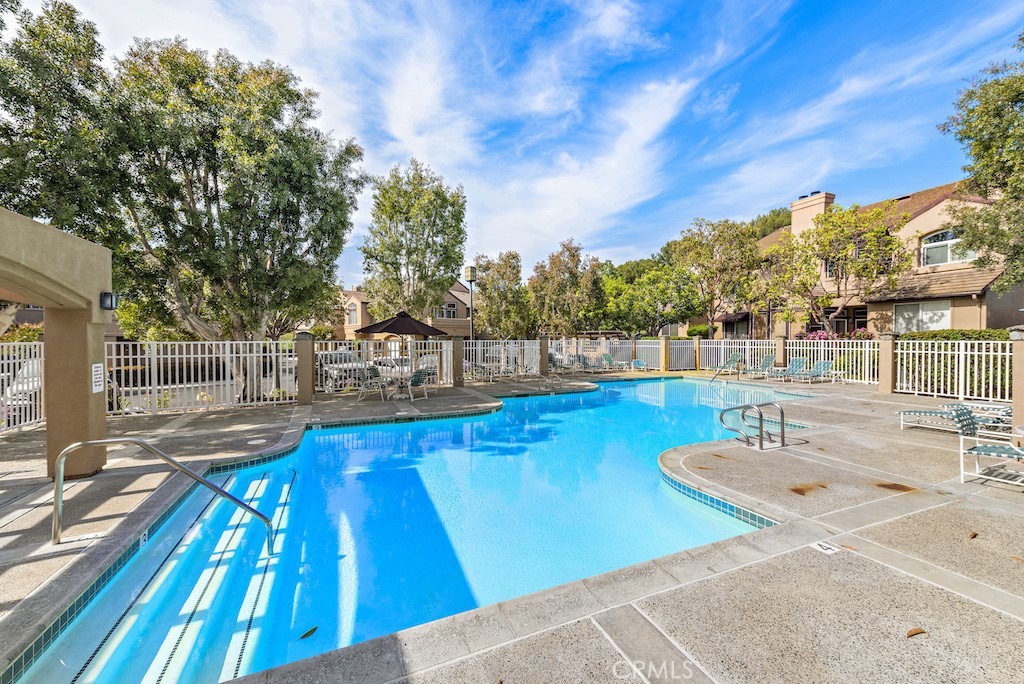 12 Bright Water Drive Dana Point, CA 92629 - Photo 22 of 24 a view of a swimming pool with an outdoor seating