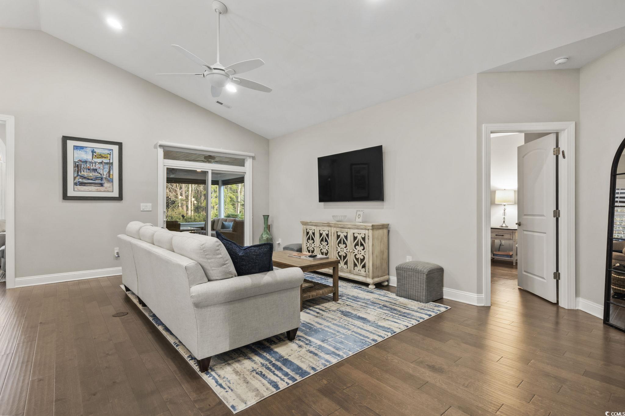 636 Elmwood Circle Murrells Inlet, SC 29576 - Photo 11 of 36 Living area featuring vaulted ceiling, ceiling fan, dark wood-style flooring, and recessed lighting