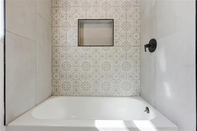 a bathroom with a bathtub
