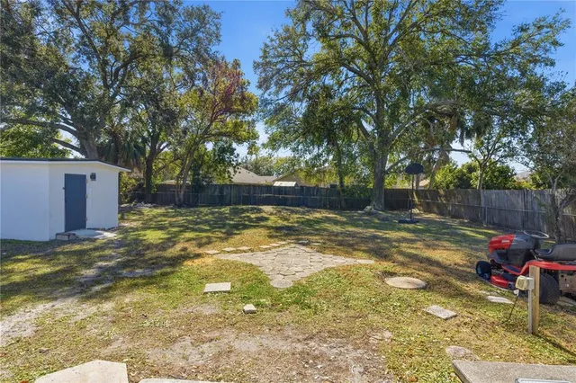 a view of backyard with slide