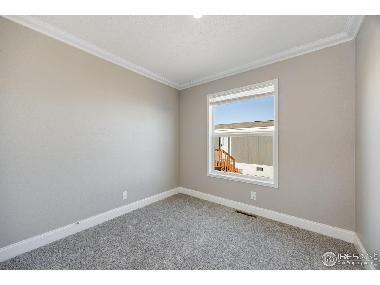 830 1st Street, Unit 16 Pierce, CO 80650 - Photo 12 of 15 an empty room with a window