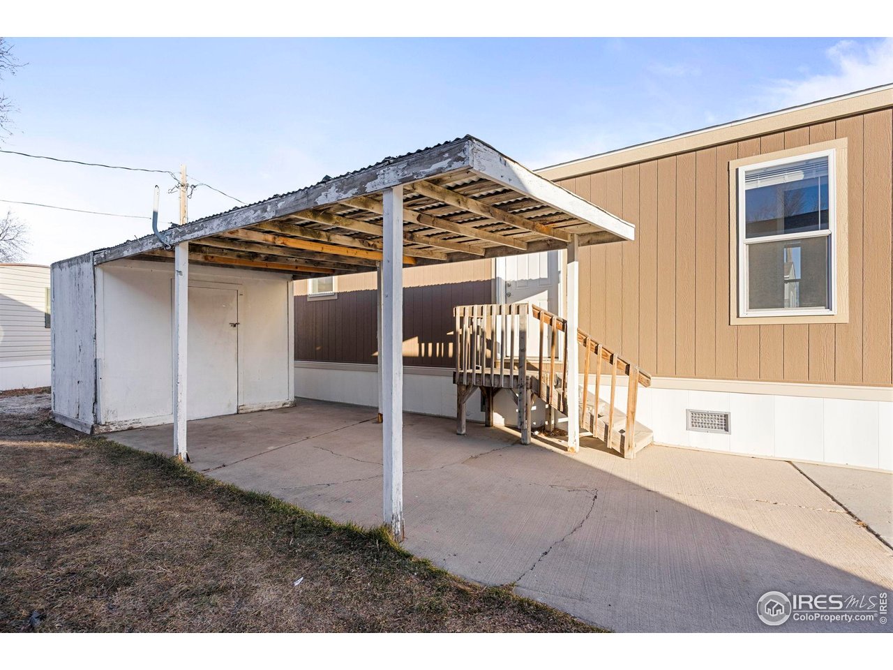 830 1st Street, Unit 16 Pierce, CO 80650 - Photo 2 of 15 a view of a house with a outdoor space