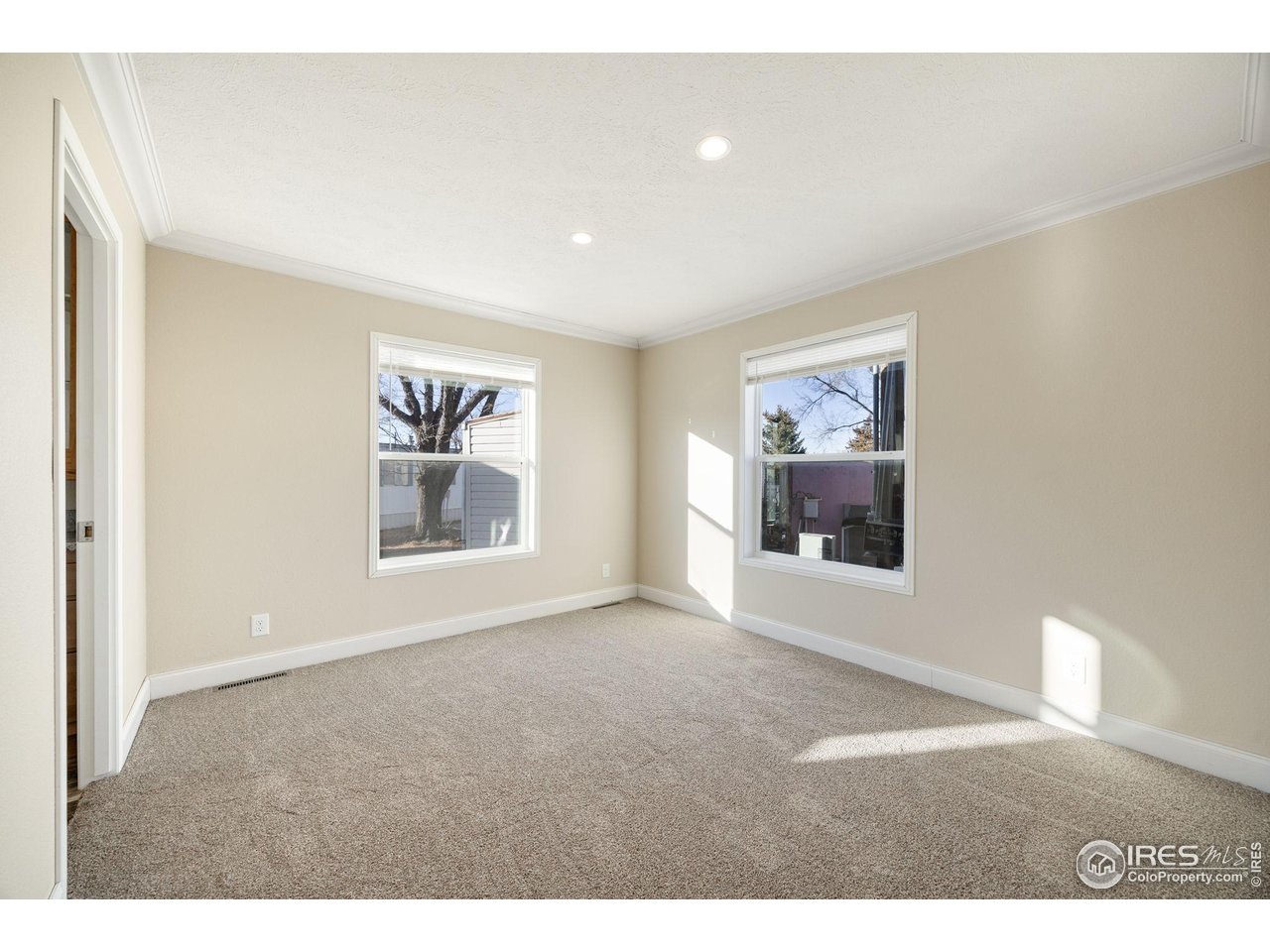 830 1st Street, Unit 16 Pierce, CO 80650 - Photo 9 of 15 a view of an empty room with a window