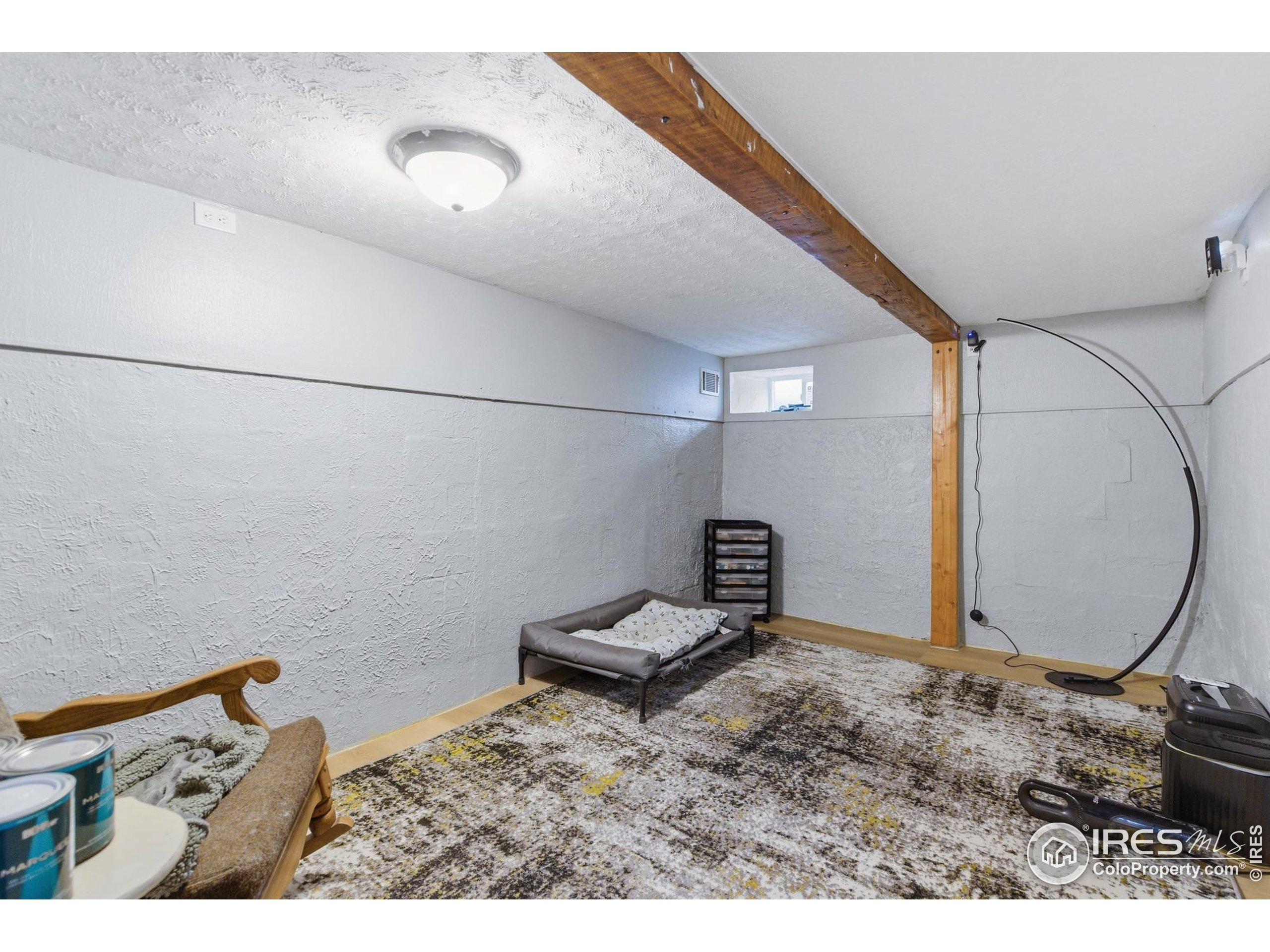 7905 3rd Street Wellington, CO 80549 - Photo 17 of 25 a view of a livingroom with wooden floor