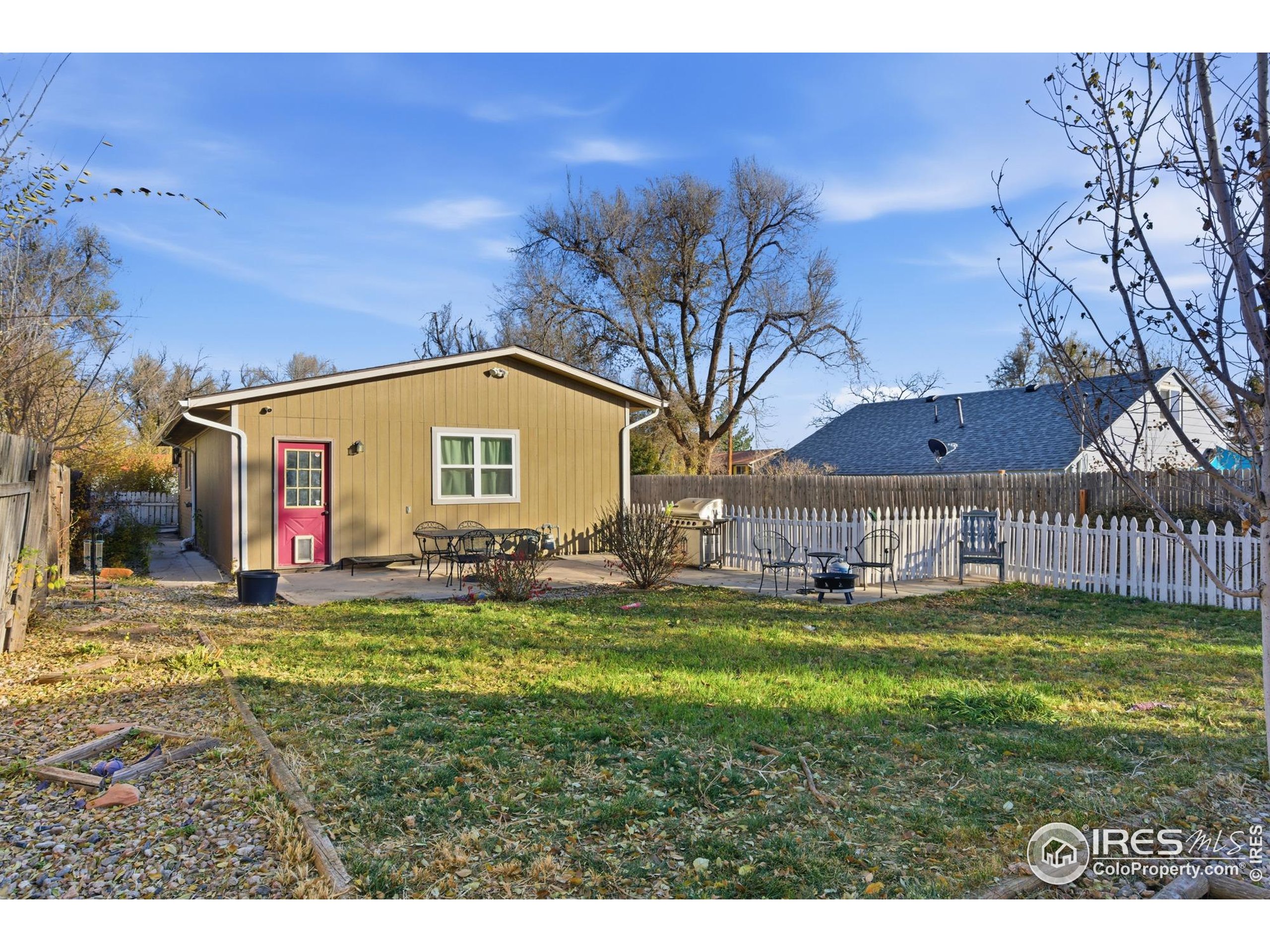 7905 3rd Street Wellington, CO 80549 - Photo 22 of 25 a view of a house with a yard