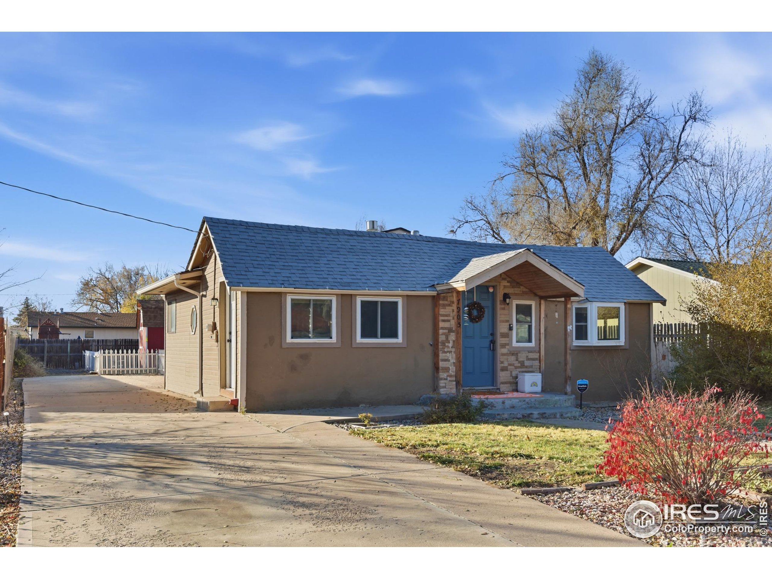 7905 3rd Street Wellington, CO 80549 - Photo 25 of 25 a front view of a house with a yard