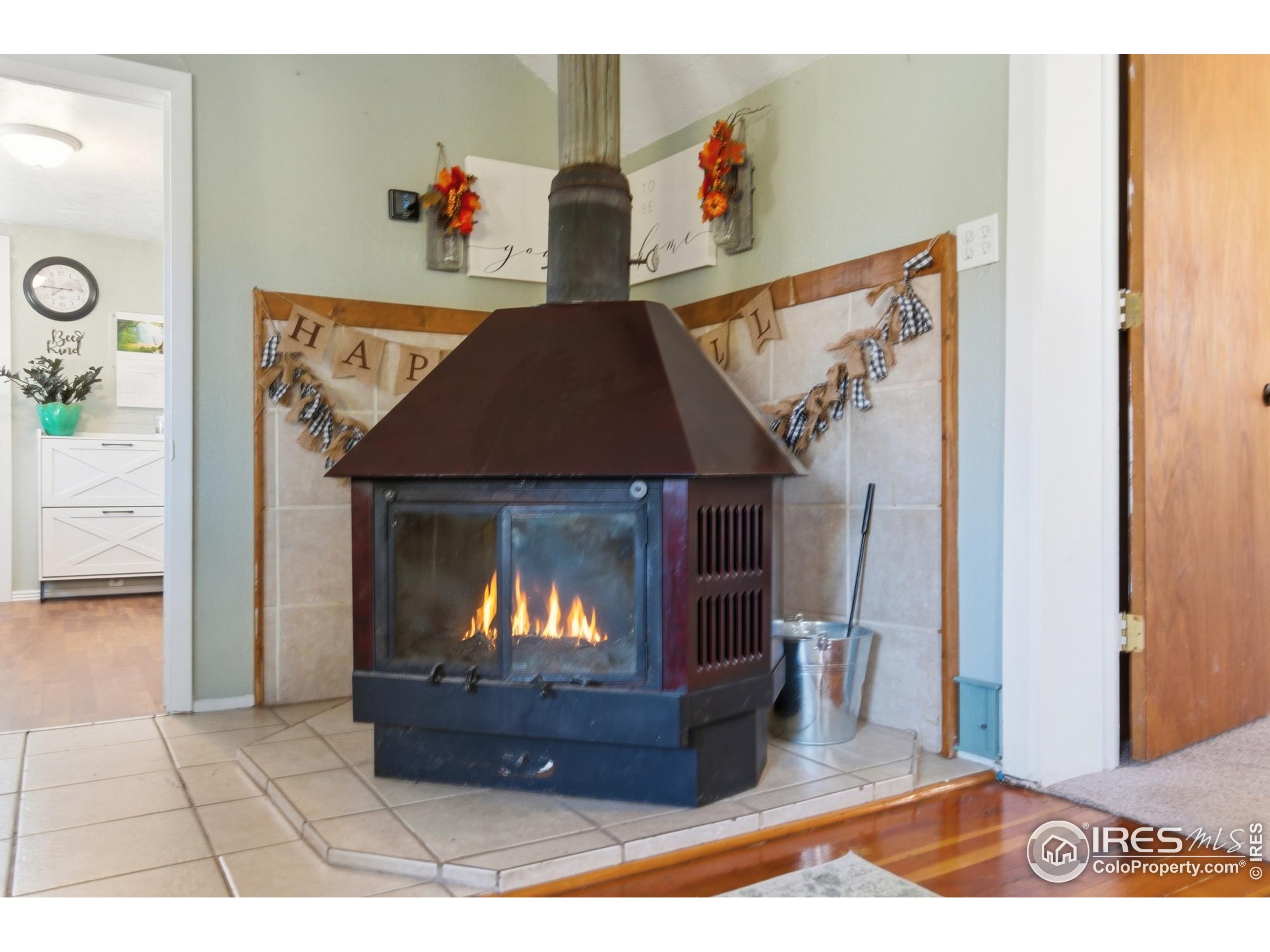 7905 3rd Street Wellington, CO 80549 - Photo 5 of 25 a view of living room with furniture and a fireplace